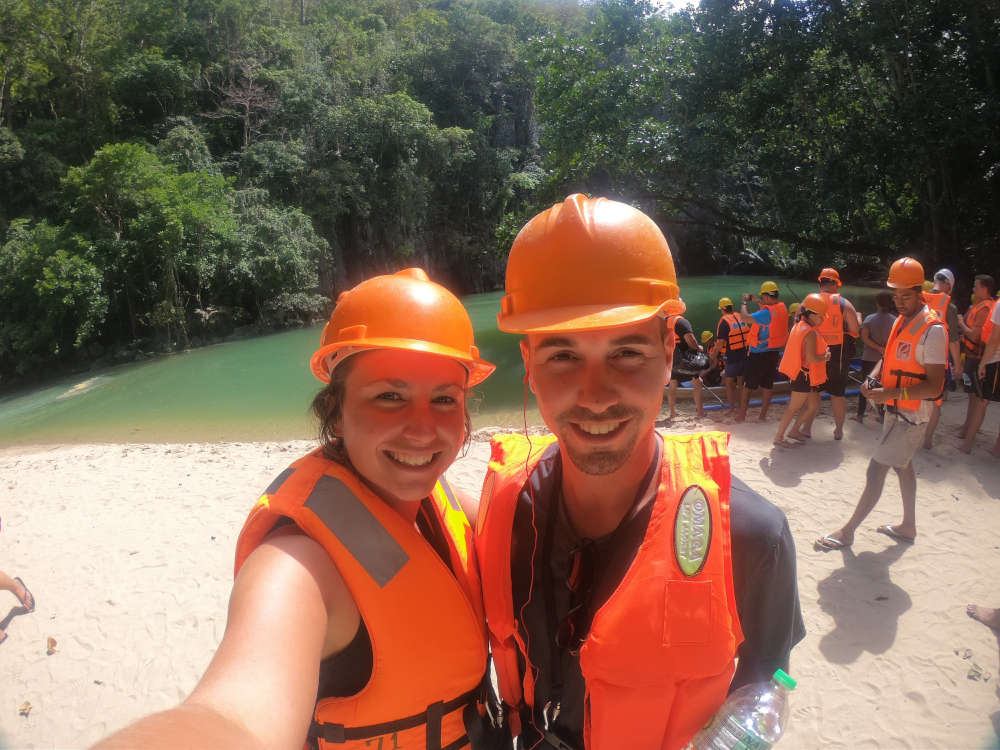 Dani and Tasha wild water rafting with hard hats on