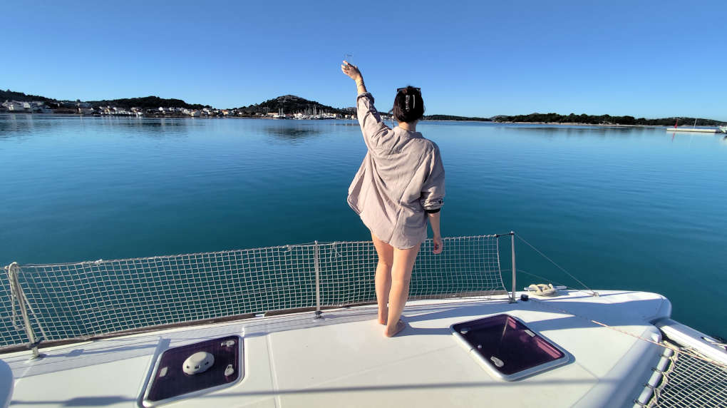 Natasha with drink in hand on Salty Breeze
